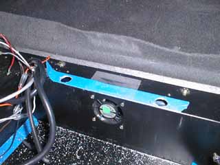 Cooling system plumbing holes, upper side