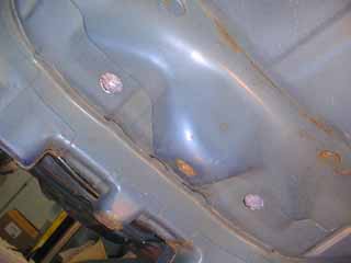 Underside cooling system plumbing holes