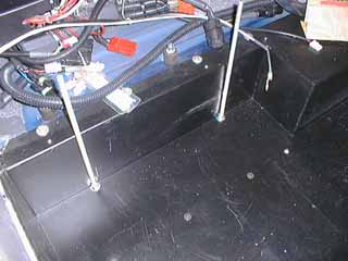 Driver's side battery hold-down rods